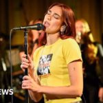 Elton John and Dua Lipa pursue safeguards against AI