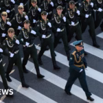 Russian President Vladimir Putin organizes Victory Day parade under strict security measures and a brief truce.