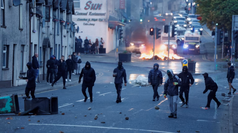 ‘Racially driven’ incidents lead to another night of disturbances in a Northern Irish township.