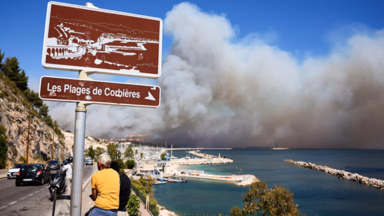 Authorities in Marseille order citizens to remain inside due to massive blaze nearing the city