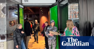 Melbourne’s century-old bookshop moved with the help of hundreds who formed a human chain.