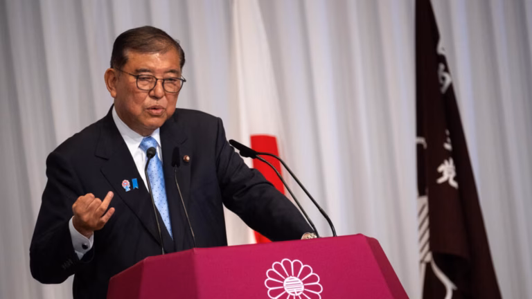 Japanese Prime Minister remains in office to address rising prices and US trade restrictions following a tough election defeat