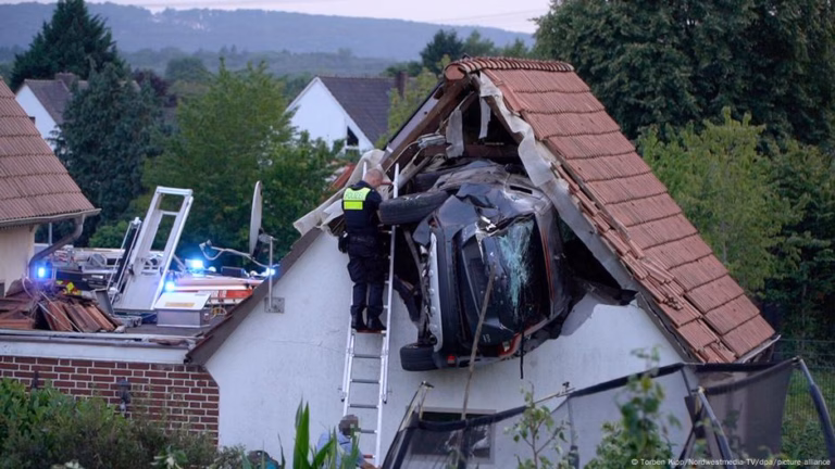Vehicle crashes into trampoline and ends up lodged in the roof of a barn – DW – July 21, 2025