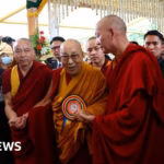 Tens of thousands gather to commemorate the summit of the exiled Tibetan leader’s 90th birthday