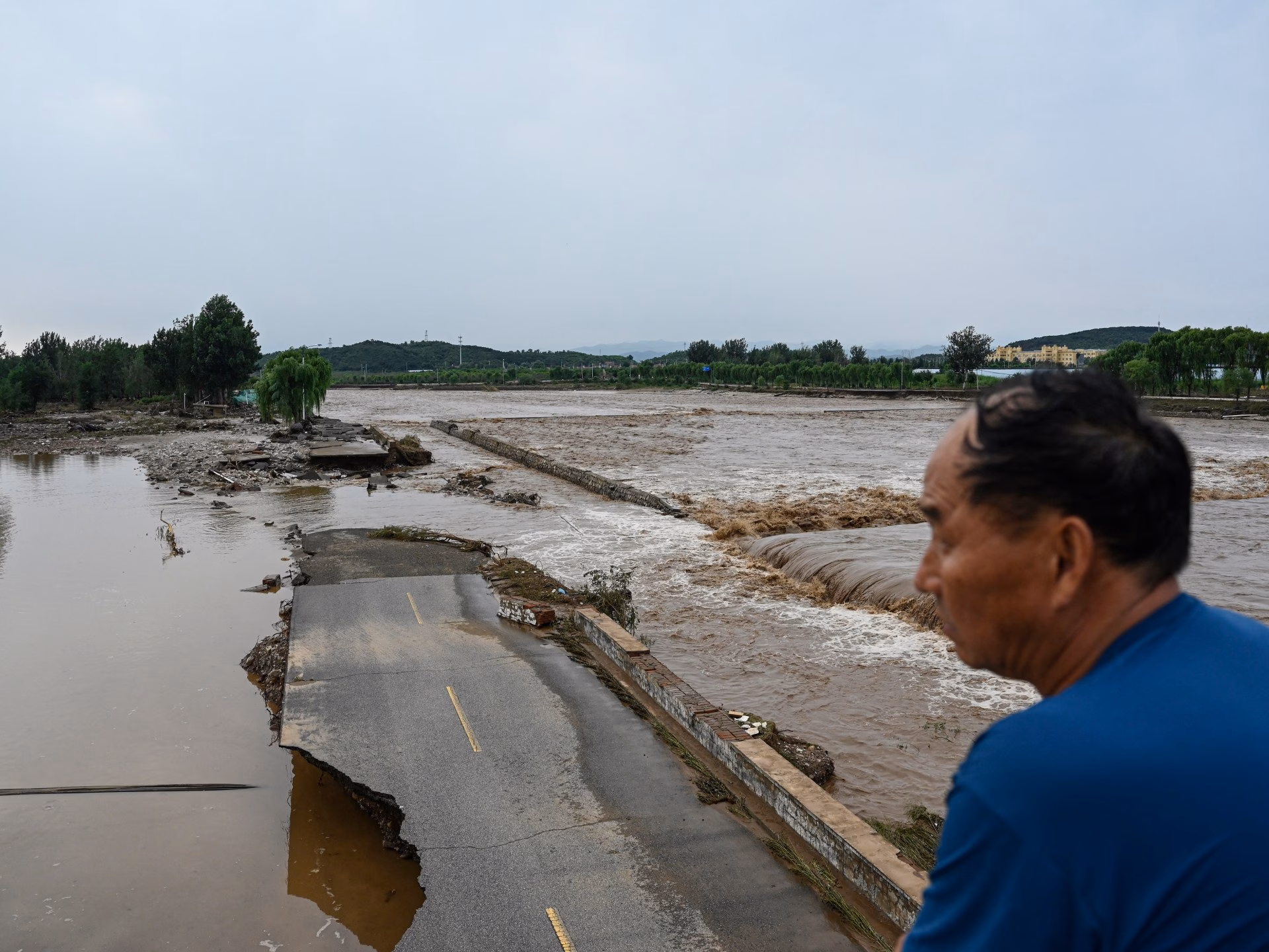 Afp 20250728 682n2g4 v2 highres topshotchinaenvironmentweatherfloods 1753749424.jpg