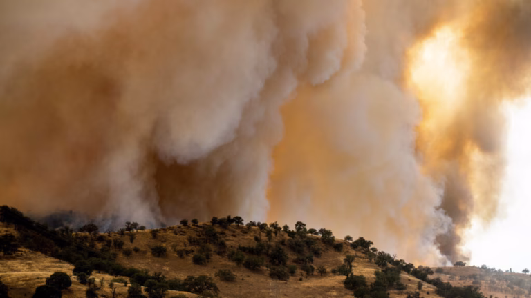 California’s biggest wildfire this year expands significantly amidst sweltering temperatures and strong breezes.