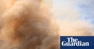 California faces devastating wildfire as blaze consumes 83,000 acres and poses risk to numerous buildings amidst ongoing wildfire crisis.