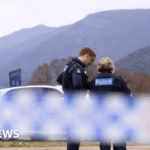 Authorities release name of wanted individual in ongoing pursuit following police shooting incident in Australia