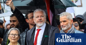 Julian Assange Participates in Pro-Palestinian Demonstration on Sydney Harbour Bridge Until Interruption by Authorities Over Safety Concerns | Sydney Harbour Bridge