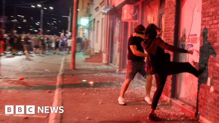 Serbian opposition supporters torch ruling party headquarters during ongoing protests on fifth night