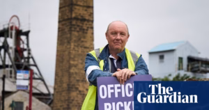Returnees from the 1980s mining strikes take up picket duty again, this time outside a mining museum | Labor protests