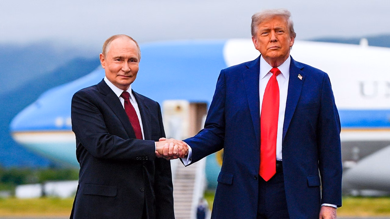 Putin trump handshake alaska.jpg