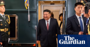 North Korea’s Supreme Leader, Kim Jong-un, arrives in Beijing for a military parade on a special train equipped with armored vehicles.