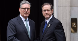 Israeli President Herzog Engages in Debate with British Prime Minister Regarding Israel-Palestine Conflict