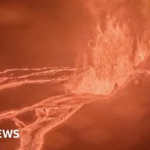 Volcano Kilauea spouts plumes of molten rock as it erupts.
